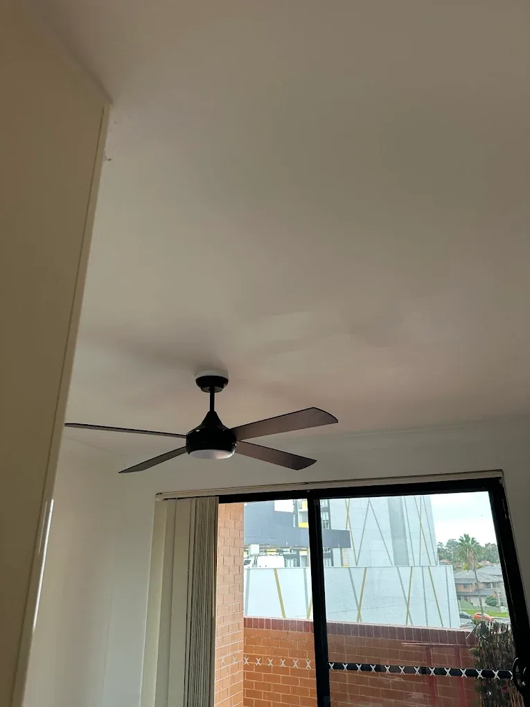 Ceiling fan installed in a bedroom