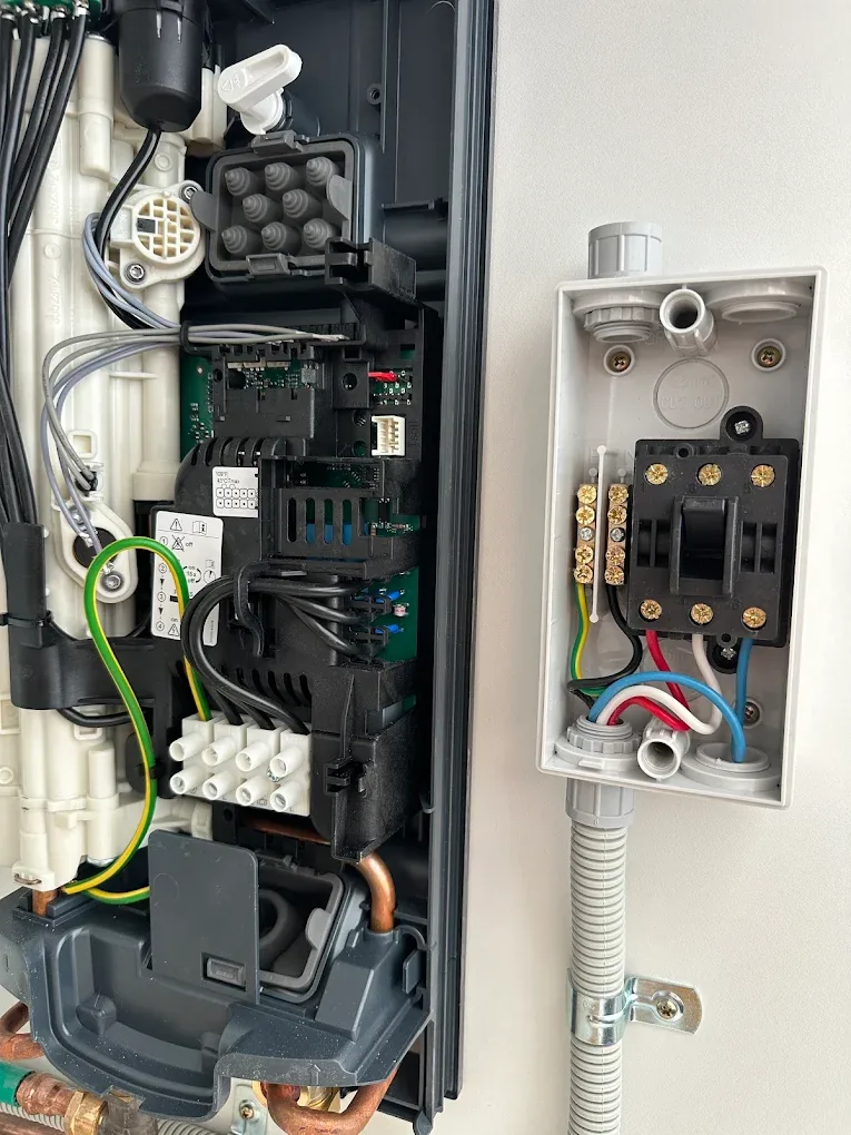 Electrician diagnosing a tripping circuit
